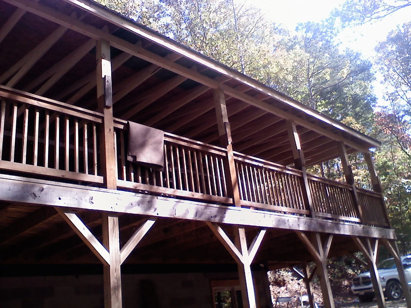 Timber framing under a new elevated porch and deck — Roof Leak Repair in Laclede by Roofing Brothers